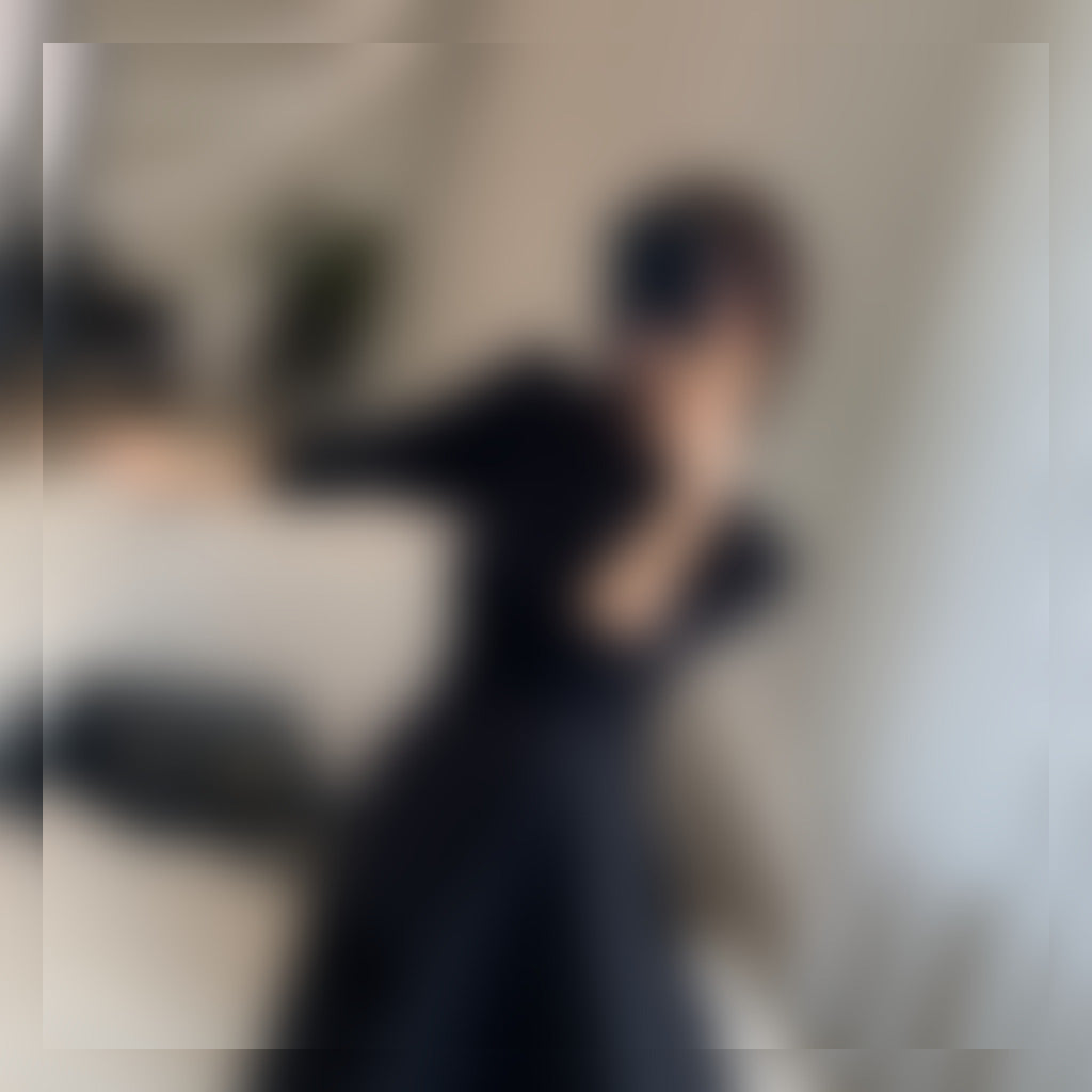 Noir Elegance Midi Dress seated view